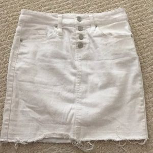 White skirt with frayed bottom